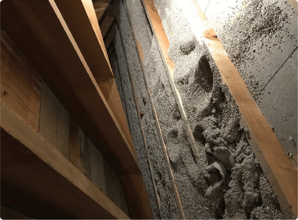 Attic renovation, exposed beams and insulation.