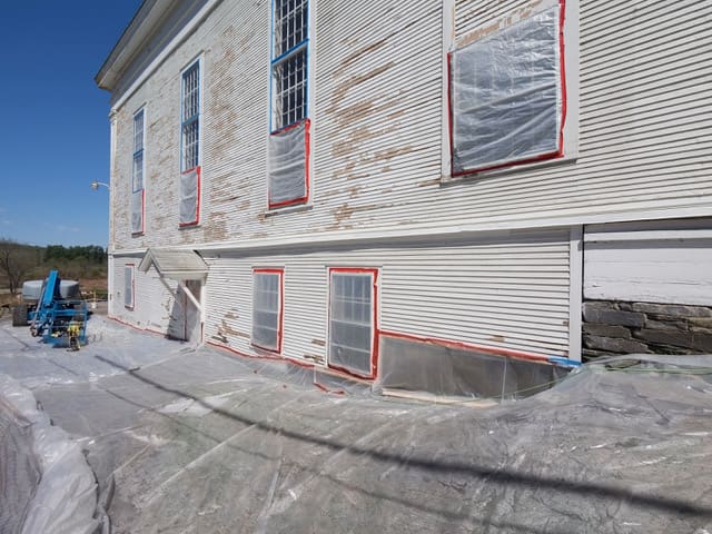 Historic building undergoing exterior renovations with scaffolding