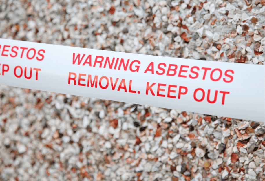 Warning tape for asbestos removal over gravel
