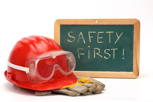 Safety gear in front of a chalkboard