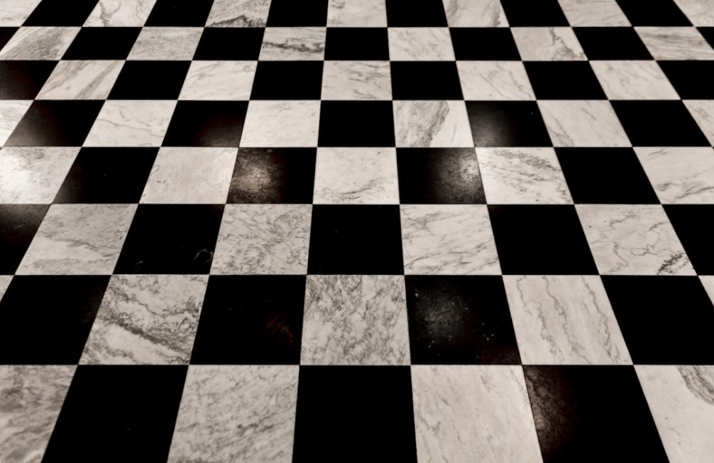 Checkered floor tile pattern that may contain asbestos in older Madison WI homes